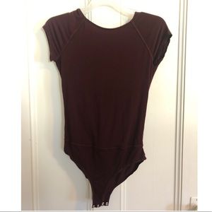 Free People Maroon body suit with open back NWOT
